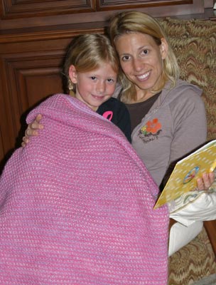 Isabella's blanket using Malabrigo merino yarn, shocking pink & orchid