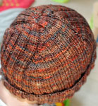 Malabrigo Arroyo Yarn, color marte, hat pattern