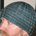 Malabrigo Arroyo Yarn, color 855 aquas, knitted cap