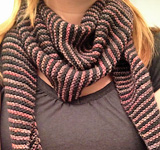 Malabrigo Arroyo Yarn, color chispas knitted striped scarf