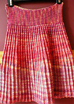 Isobel knitted skirt; knitted cardigan sweater; Malabrigo Silky Merino Yarn, color 850 archangel