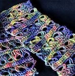 handknit lacey scarf,  neck warmer; Malabrigo Silky Merino Yarn, color 866 arco iris