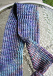 knitted scarf; knitted cardigan sweater; fingerless mittens, gloves; Malabrigo Silky Merino Yarn, color 436 Atardecer