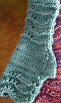 knit fingerless mitten; Malabrigo Silky Merino Yarn, color 411 green gray