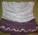 knitted baby dress; Malabrigo Silky Merino Yarn, color 869 cumparsita