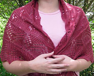 handknit lacey scarf; Malabrigo Silky Merino Yarn, color 401 raspberry