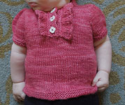 handknit baby sweater;
