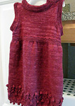 handknit child's sweater dress; Malabrigo Silky Merino Yarn, color 400 rupestre