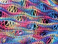 handknit lacey drop stitch shawl; Malabrigo Silky Merino Yarn, color 400 rupestre