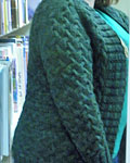 handknit cabled cardigan; Malabrigo Worsted Merino Yarn color VAA #51