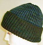 handknit ribbed cap,  hat; Malabrigo Worsted Merino Yarn color VAA #51