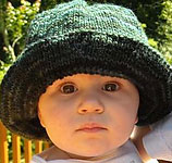 handknit baby brimmed bucket hat free pattern ; Malabrigo Worsted Merino Yarn color VAA #51