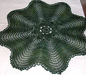 handknit circular blanket; Malabrigo Worsted Merino Yarn color VAA #51