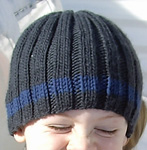 knitted ribbed hat; pullvoer cabled sweater; Malabrigo Worsted Yarn, color blue graphite #508
