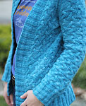 handknit long sleeve cabled cardigan; Malabrigo Merino Worsted Yarn color bobby blue