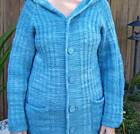 handknit long sleeve hooded cardigan; Malabrigo Merino Worsted Yarn color bobby blue