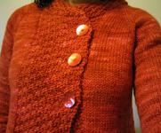 hand knit cardigan sweater; Malbrigo Worsted Merino, color 194 cinnabar