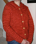 Hooded jacket knitting pattern; Malbrigo Worsted Merino, color 194 cinnabar