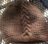 Cabled Molly hat; Malbrigo Worsted Merino Yarn, color coco #624