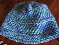 Malabrigo Worsted Merino Yarn, color emerald blue #137, hat