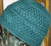 Malabrigo Worsted Merino Yarn, color emerald #135, hat