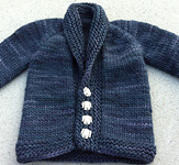 handknit shawl collar child's sweater;
