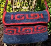 handknit felted purse; Malabrigo Merino Worsted Yarn, color paris night & red