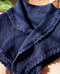 handknit shawl, wrap with lace edging;