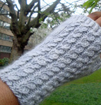 Malabrigo Worsted Merino Yarn, color polar morn #9, knitted wristlette