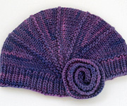 handknit child's cloche, hat, cap free knitting pattern; Malabrigo Worsted Yarn, color purple magic #609