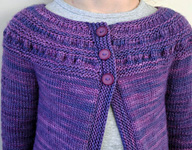 tiny Leaves Child's cardigan handkniiting pattern; Malabrigo Worsted Yarn, color purple magic #609