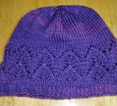 Windy City Hat free knitting pattern; Malabrigo Worsted Yarn, color purple magic #609