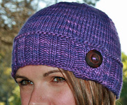 button-tab hat free knitting patterns; Malabrigo Worsted Yarn, color purple magic #609
