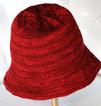 Malabrigo merino Worsted Yarn, color sealing wax 102, knitted bucket hat free knitting pattern