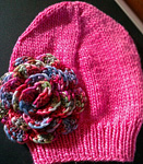 Malabrigo merino Worsted Yarn, color 184 shocking pink, knitted hat