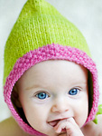 knit baby hat, cap; Malabrigo merino Worsted Yarn, color shocking pink #184
