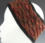 handknit headband; Malabrigo Merino Worsted Yarn color stonechat & black