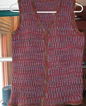 handknit sweater vest; Malabrigo Merino Worsted Yarn color stonechat & burgundy