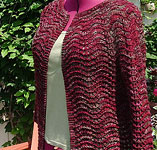 handknit wavy knit cardigan sweater; Malabrigo Merino Worsted Yarn color stonechat