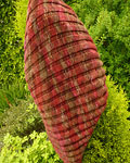 handknit lacey shawl, wrap; Malabrigo Merino Worsted Yarn color stonechat