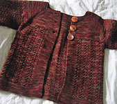 handknit child's cardigan sweater; Malabrigo Merino Worsted Yarn color stonechat