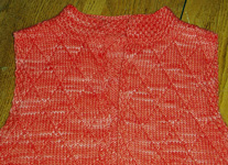 Malabrigo Worsted Yarn, color 152 tiger lily, knitted vest