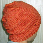 knitted hat; cap; Malabrigo Worsted Yarn, color #152 tiger lily