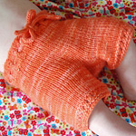 knitted baby pants; Malabrigo Worsted Yarn, color #152 tiger lily