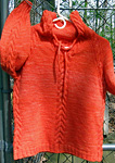 hooded pullover sweater;  Malabrigo Worsted Yarn, color #152 tiger lily