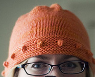 cap, hat  free knitting pattern; Malabrigo Worsted Yarn, color #152 tiger lily