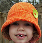 child's hat; cap  free knitting pattern; Malabrigo Worsted Yarn, color #152 tiger lily