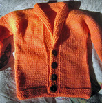 cardigan sweater free knitting pattern; Malabrigo Worsted Yarn, color #152 tiger lily