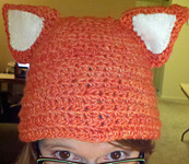 knitted cap with ears; Malabrigo Worsted Yarn, color #152 tiger lily
