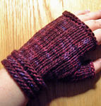 Malabrigo Worsted Yarn, color 204 velvet grapes, fingerless gloves